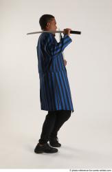 Garson STANDING POSE WITH KATANA AND SHOTGUN